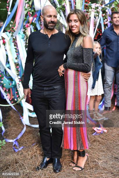 Scott Sabbagh and Martha Fareed attend The 24th Annual Watermill Center Summer Benefit & Auction at The Watermill Center on July 29, 2017 in Water...