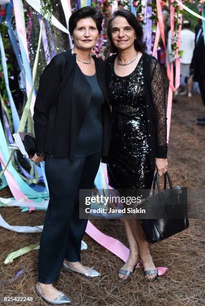 Cecile Panzieri and Janine Cirincione attend The 24th Annual Watermill Center Summer Benefit & Auction at The Watermill Center on July 29, 2017 in...