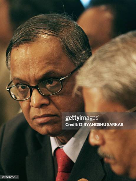 Chief Executive Officer of Infosys Technologies Limited Kris Gopalakrishnan is watched by Infosys Chief Mentor N. R. Narayanamurty as he addresses a...