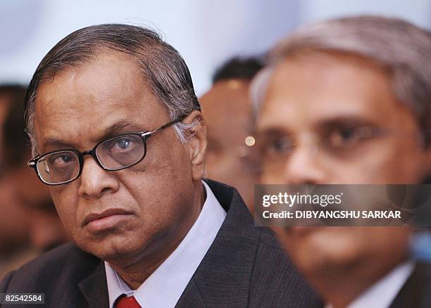 Chief Executive Officer of Infosys Technologies Limited Kris Gopalakrishnan is watched by Infosys Chief Mentor N. R. Narayanamurty as he addresses a...