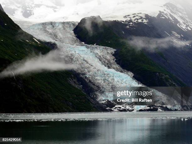 cascade glacier in the clouds - coastal deprivation stock pictures, royalty-free photos & images