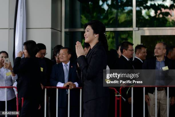 Thailand's former Prime Minister Yingluck Shinawatra arrives at the Supreme Court.