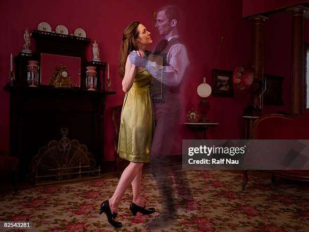 woman dancing with ghost - espectro imagens e fotografias de stock