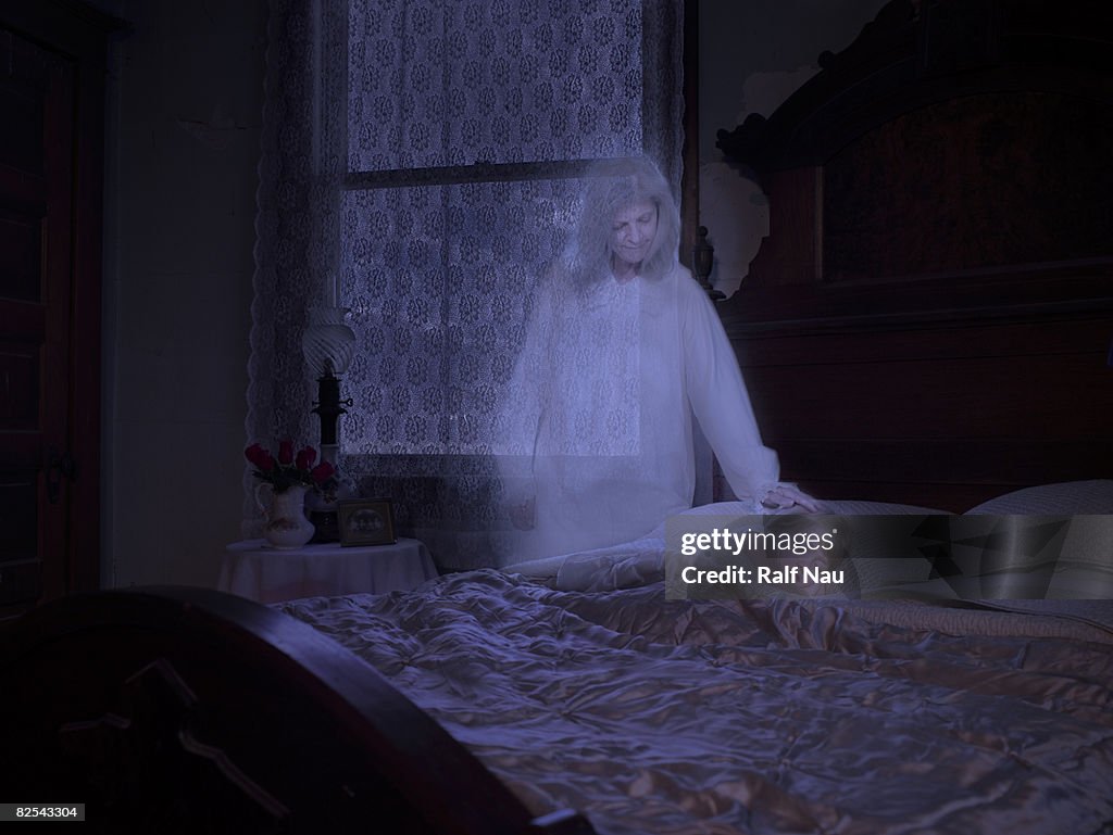 Ghost touching sleeping granddaughter
