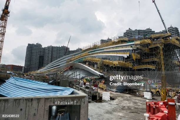 The West Kowloon Terminus of the Guangzhou-Shenzhen-Hong Kong Express Rail Link , developed by MTR Corp., stands under construction in Hong Kong,...