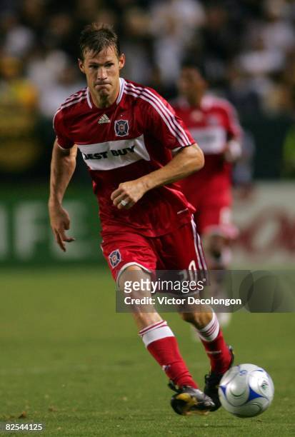 Brian McBride of the Chicago Fire passes the ball near midfield against the Los Angeles Galaxy during their MLS match at The Home Depot Center on...