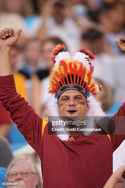 Fan of the Washington Redskins watches play against the Carolina Panthers at Bank Of America Stadium on August 23, 2008 in Charlotte, North Carolina.