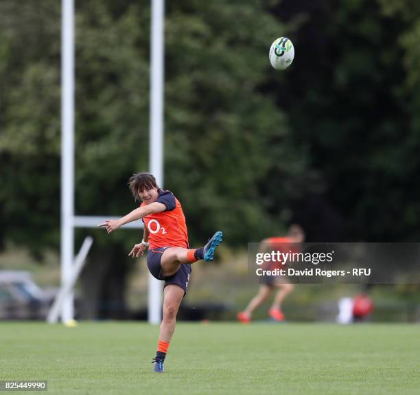 Katy Mclean kicks the ball upfield during the England Women training session held at The Lensbury on August 1, 2017 in Teddington, England.