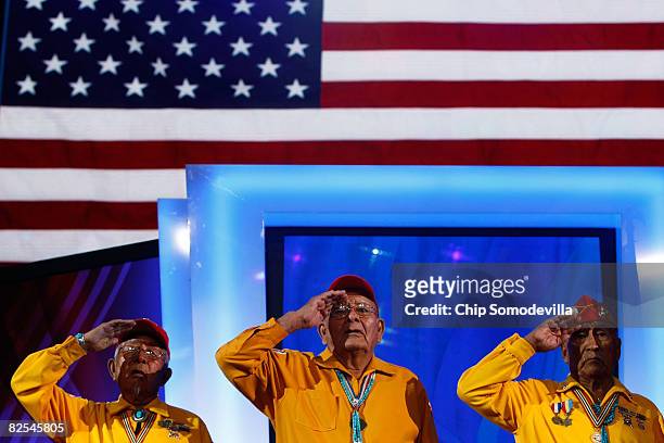 Members of the Navajo Code Talkers Association salute during the Presentation of Colors during day one of the Democratic National Convention at the...