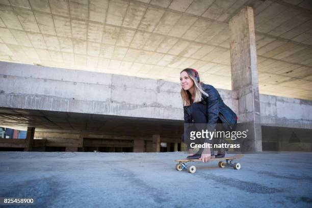 skating with my music - gangster girl stock pictures, royalty-free photos & images