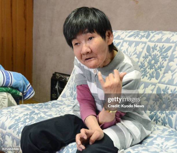 Photo taken in June 2017 in the southwestern Japan city of Minamata shows Shinobu Sakamoto, a Minamata disease patient, who will visit Switzerland in...