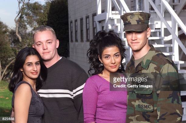 Bahraini princess, Meriam Al-Khalifa, U.S. Marine Lance Corporal Jason Johnson, actors Mark-Paul Gosselaar and Marisol Nichols who portray the two...