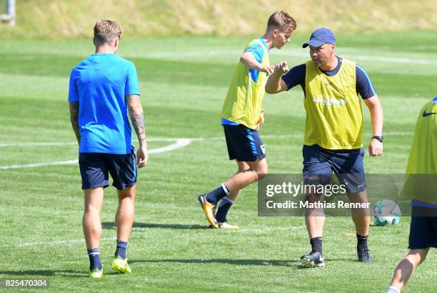 Coach Pal Dardai gives instructions next to Alexander Esswein of Hertha BSC during the training camp on august 2, 2017 in Schladming, Austria.