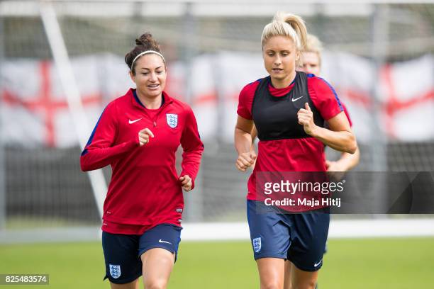 Jodie Taylor and Steph Houghton run during the England Training Session at Sporting 70 on August 2, 2017 in Utrecht, Netherlands.