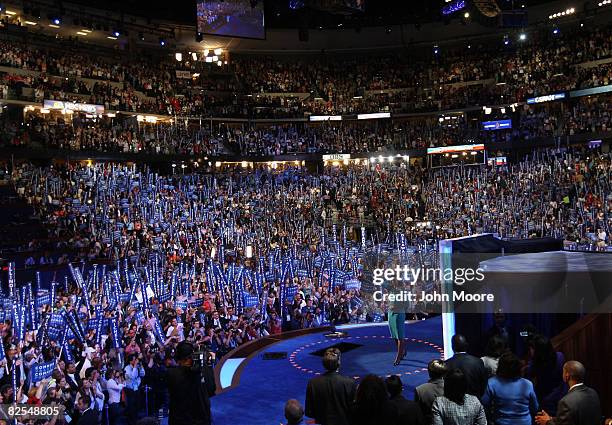 Michelle Obama, wife of presumptive Democratic nominee U.S. Sen. Barack Obama , stands on stage during day one of the Democratic National Convention...