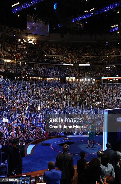 Michelle Obama, wife of presumptive Democratic nominee U.S. Sen. Barack Obama , stands on stage during day one of the Democratic National Convention...