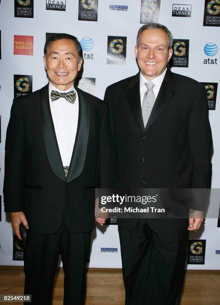 Actor George Takei and husband Brad Altman arrive at 30th Anniversary of the Gay Men's Chorus of Los Angeles concert held at the Walt Disney Concert...