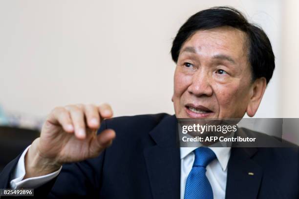 International Boxing Association president Wu Ching-Kuo gestures during an interview with AFP at their headquarters at the the International House of...