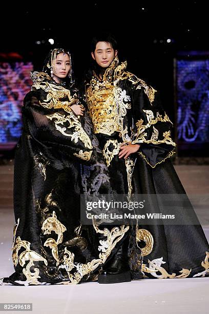 Chae -Young and Park Si-Hoo showcase designs by Korean couture designer Andre Kim at the opening catwalk show on the first day of Bali Fashion Week...