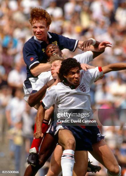 Scotland defender Alex McLeish outjumps England players John Fashanu; Stuart Pearce and Des Walker during the 1989 Rous Cup International at Hampden...