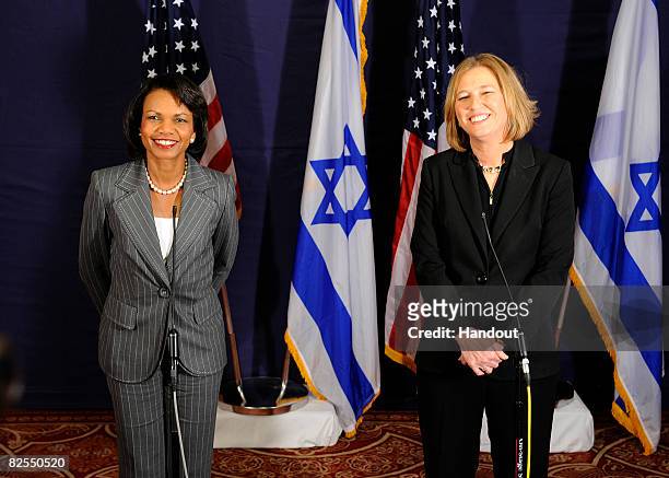 In this handout photo provided by the U.S. Embassy in Tel Aviv, Secretary of State Condoleezza Rice attends a press conference with Israeli Foreign...