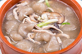 taro dumplings soup with mushroom and pork meat