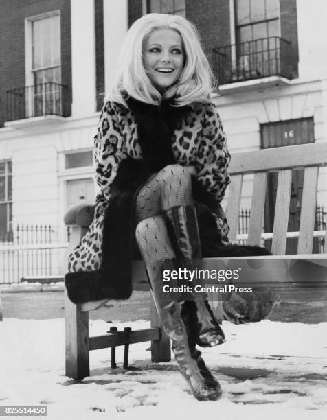 Italian actress Virna Lisi on a snowy day in Chelsea, London, 11th December 1967. She is in the capital to work on the film 'Better A Widow' .
