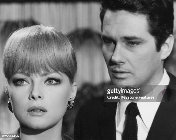 Italian actress Virna Lisi and actor Brett Halsey in a scene from the film 'Le Dolci Signore' , March 1967.