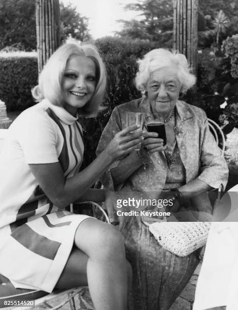 Italian actress Virna Lisi and English actress Margaret Rutherford at a press conference in Rome, Italy, before commencing work on the Italian film...
