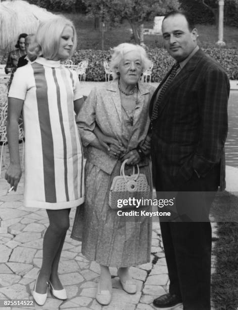 From left to right, Italian actress Virna Lisi , English actress Margaret Rutherford and Italian director Mauro Bolognini at a press conference in...