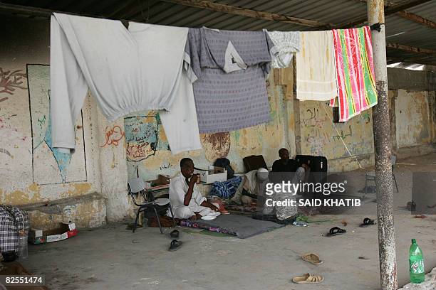 Egyptians stranded in the Gaza Strip due to the closure of the crossing between southern Gaza and Egypt sit at a school yard in the border town of...