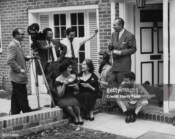 Actress Bebe Daniels and her husband, actor Ben Lyon with their children Richard and Barbara on the steps of their new home in Abbotsbury Road, West...