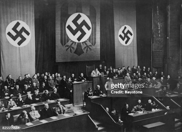 German Chancellor Adolf Hitler speaks at the Reichstag in Berlin, Germany, prior to the entry of German troops into the Rhineland, 7th March 1936....