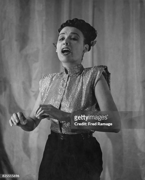 American singer and actress Lena Horne in performance, 10th November 1947.
