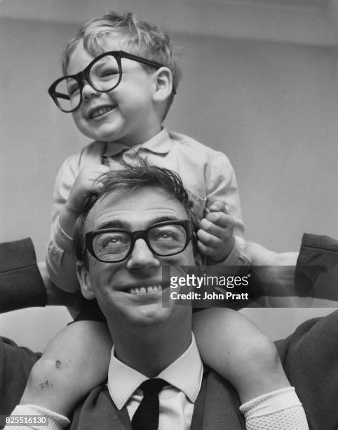 English comedian Roy Hudd with his three-year-old son Max at their home in Croydon, London, May 1967.