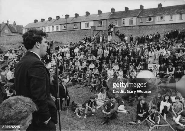 Irish politician John Hume addresses a Catholic meeting at the Celtic Park football ground in Londonderry, Northern Ireland, before a parade by the...