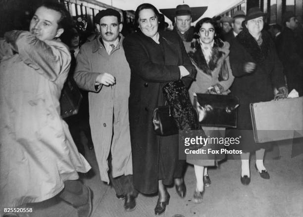 Spanish Republican heroine and Communist politician Dolores Ibarruri, aka La Pasionaria arrives at the Gare de Lyon in Paris, France, having fled...