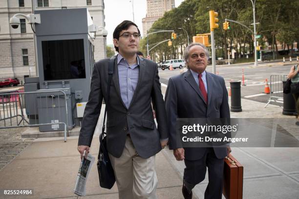 Former pharmaceutical executive Martin Shkreli and attorney Benjamin Brafman arrive at the U.S. District Court for the Eastern District of New York,...