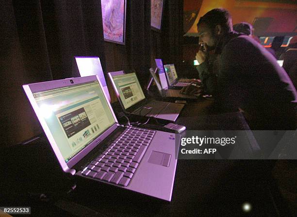 By Kara Andrade Martin Lamothe from Canada and other event goers check in with their friends during San Francisco held its first Outside Lands Music...