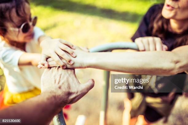 friends forever - sea of hands stock pictures, royalty-free photos & images