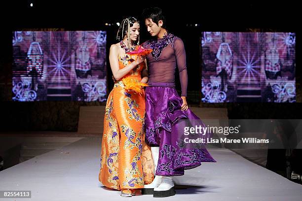 Chae -Young and Park Si-Hoo showcase designs by Korean couture designer Andre Kim at the opening catwalk show on the first day of Bali Fashion Week...