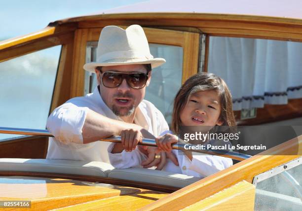 Brad Pitt and adopted son Pax Thien Jolie-Pitt take a water boat from Marco Polo Airport in Venice ahead of the 65th Venice Film Festival on August...