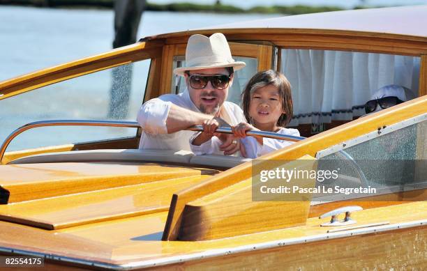 Brad Pitt and adopted son Pax Thien Jolie-Pitt take a water boat from Marco Polo Airport in Venice ahead of the 65th Venice Film Festival on August...