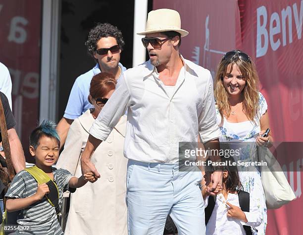 Brad Pitt with adopted son Maddox Jolie-Pitt leaves Marco Polo Airport in Venice ahead of the 65th Venice Film Festival on August 26, 2008 in Venice...