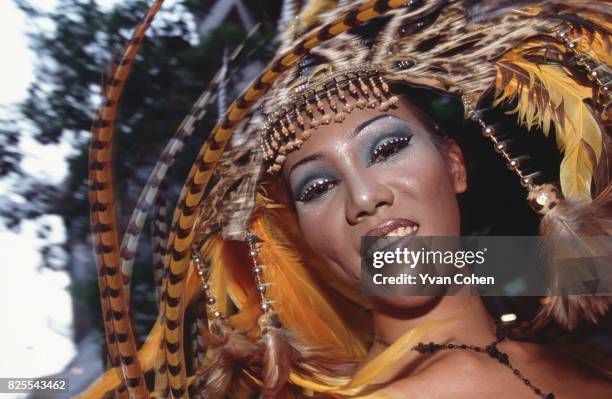 Dressed to shock, colourful participants strut their stuff during the annual Gay Pride parade in Silom road, downtown Bangkok. Thailand has a...