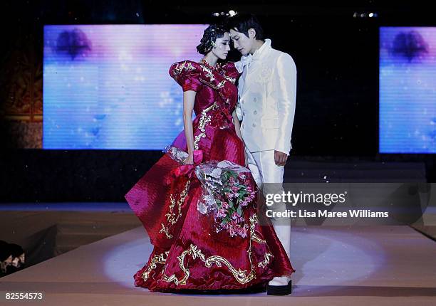 Chae -Young and Park Si-Hoo showcase designs by Korean couture designer Andre Kim at the opening catwalk show on the first day of Bali Fashion Week...