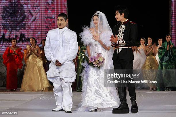 Andre Kim Korean couture designer joins Chae-Young and Park Si-Hoo on the catwalk during the first day of Bali Fashion Week 2008 at the Lotus Pond,...