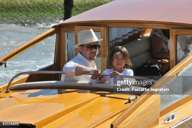 Brad Pitt and adopted son Pax Thien Jolie-Pitt take a water boat from Marco Polo Airport in Venice ahead of the 65th Venice Film Festival on August...