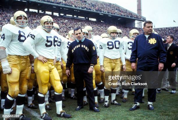 Notre Dame coach Ara Parseghian with players on field before game vs Michigan State game at Spartan Stadium. East Lansing, MI CREDIT: Rich Clarkson