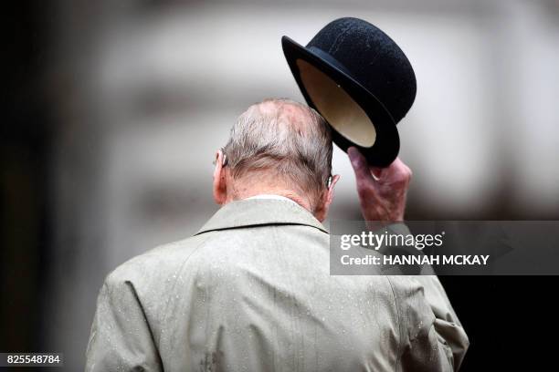 Britain's Prince Philip, Duke of Edinburgh, in his role as Captain General, Royal Marines, attends a Parade to mark the finale of the 1664 Global...